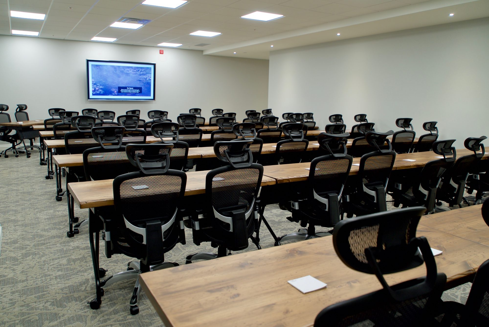 The Group of Seven meeting room set classroom-style