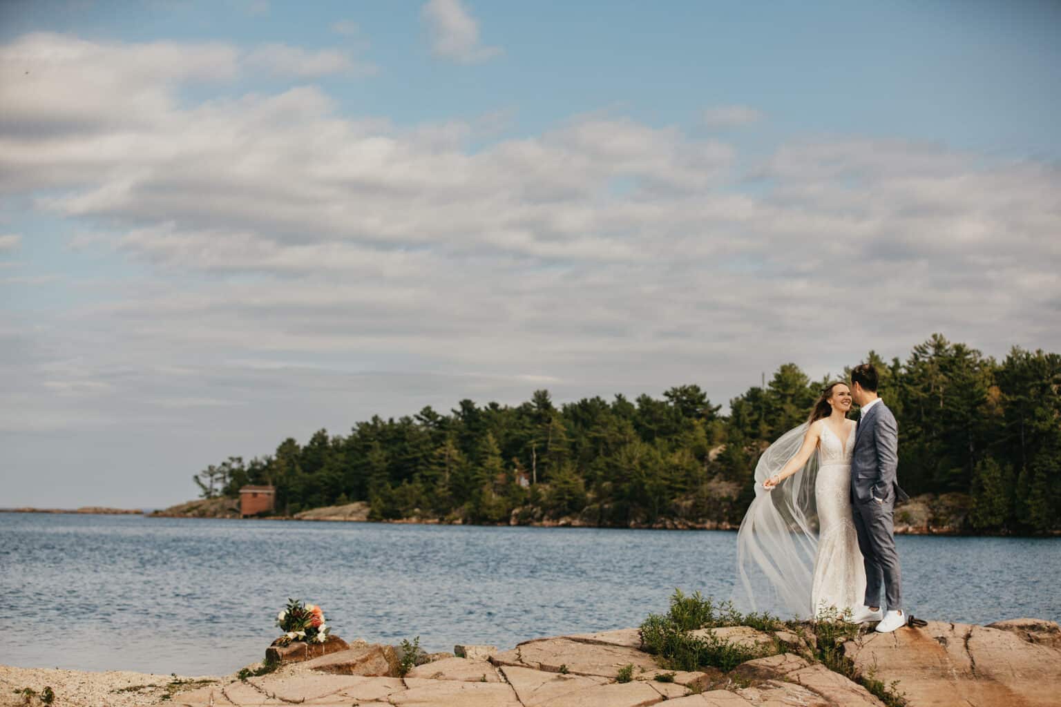 Couple on the granite shoreline